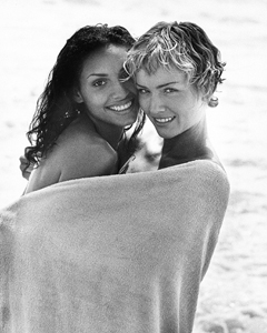 Raquel and Lauma wrapped in towel