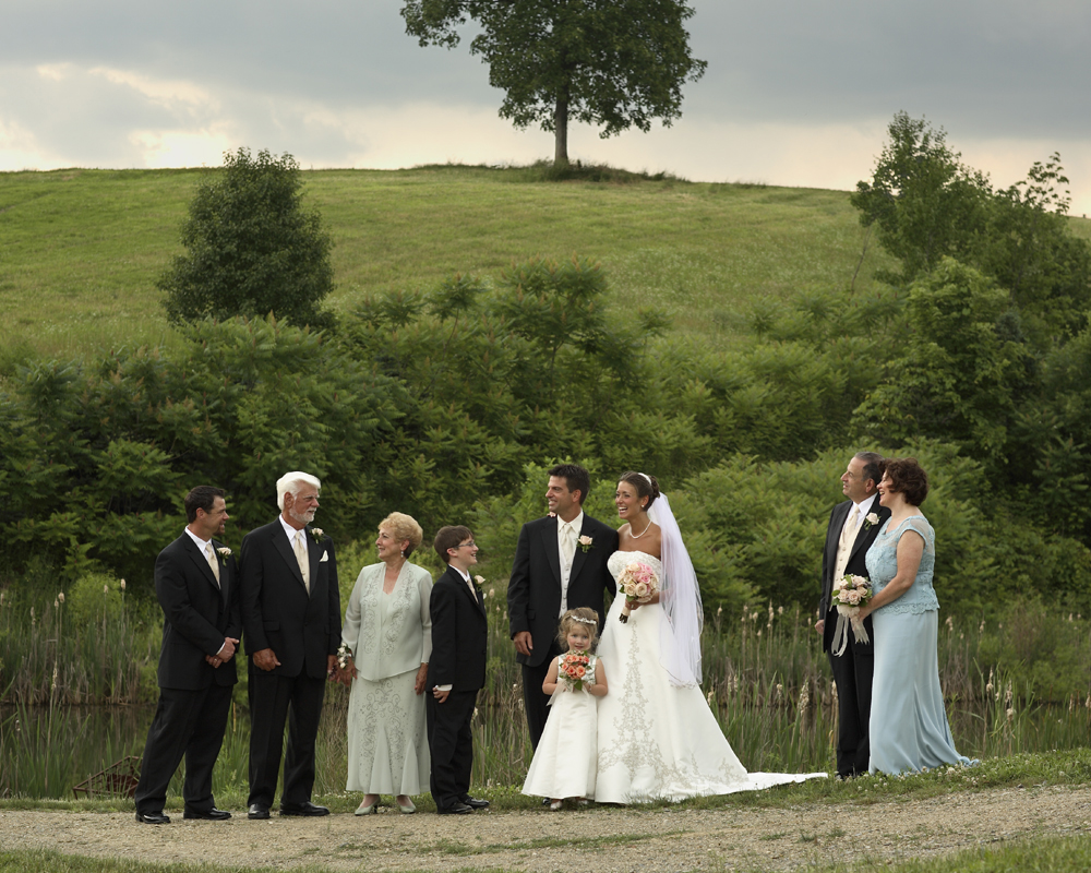 Brian and Laura McGurney outdoor, location wedding group portrait, candid, in Lehigh Valley,PA photographed by celebrity portrait photographer Steve Landis on the grounds of the Glasbern Inn, Fogelsville, PA
